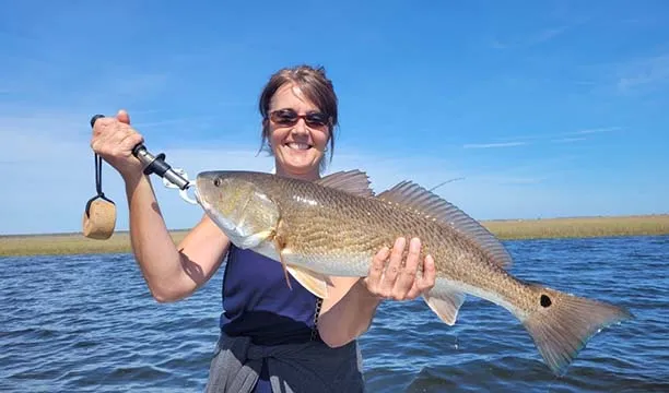 Woman holding a fish