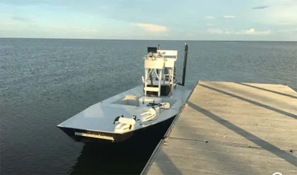 White boat at dock